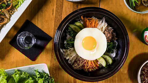 Korean Bibimbap may look like a carefully curated dish today, but its origins are surprisingly humble