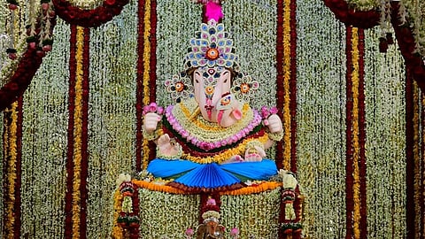 The Shreemant Dagdusheth Halwai Ganpati temple, filled with the soothing scent of mogra (jasmine) and other blooms, created a calm and devotional atmosphere