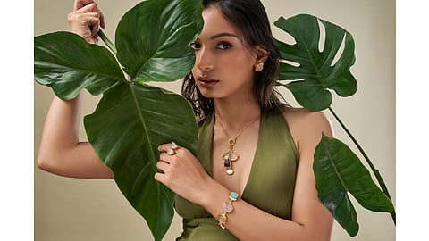 Druzy jewellery styled with neutral tones to highlight natural crystal textures