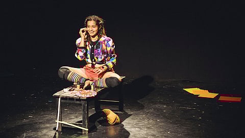 A solo exploring the space before the performance begins