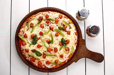 Opt for pizzas by the slice at Kalo’s on Elliot’s Beach