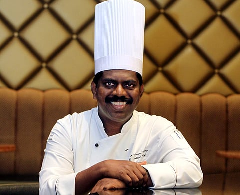 Man in white- Chef Saratchandra Banerji takes charge as the executive chef of Taj