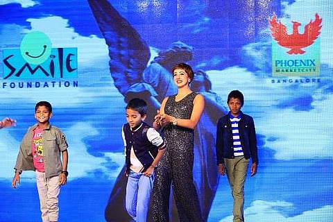 Sanjjanaa Galrani (Indian model and film actress) with Smile Foundation kids