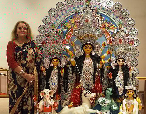 French professor of philosophy, Mireille Josephine posing with Goddess Durga