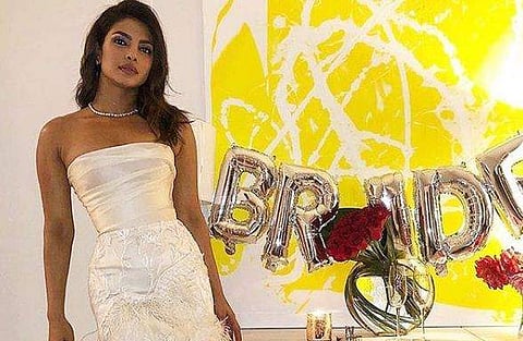 Priyanka Chopra wearing the bridal shower dress made by Georgina Chapman
