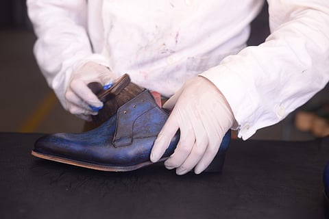 Tetsuya working on a shoe