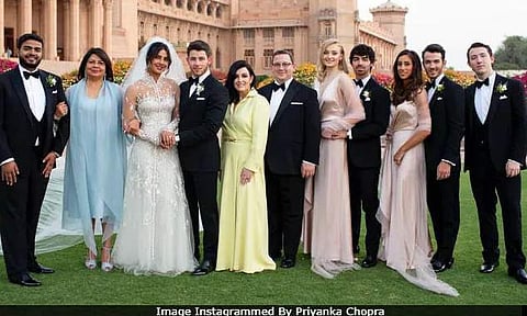 Priyanka Chopra and Nick Jonas with their families