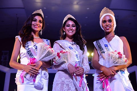 Winner of Indulge Miss Glam World 2018, Mexico's Estefania Garcia (centre) with first runner-up Fahima Abdi (right) from Kenya and India's Aileen Amon (left) as third runner-up in Kochi, on Friday