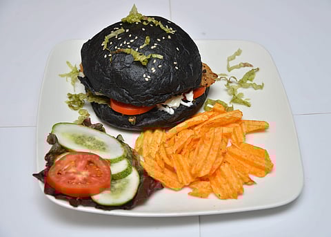Goth burgers and 'vibranium' pizzas, Black Panther fans will love this menu! 