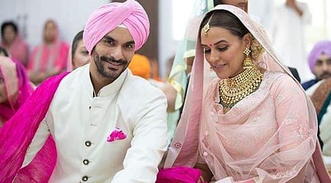 Actors Neha Dhupia and Angad Bedi married on Thursday