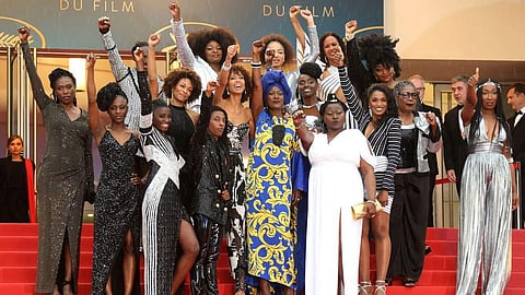 Authors of Noire N’est Pas Mon Métier protesting at the Cannes red carpet