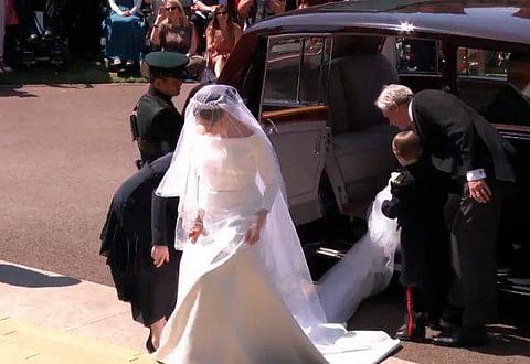 Meghan Markle entering St George's Chapel at the Windsor Castle in the Rolls Royce IV 1950