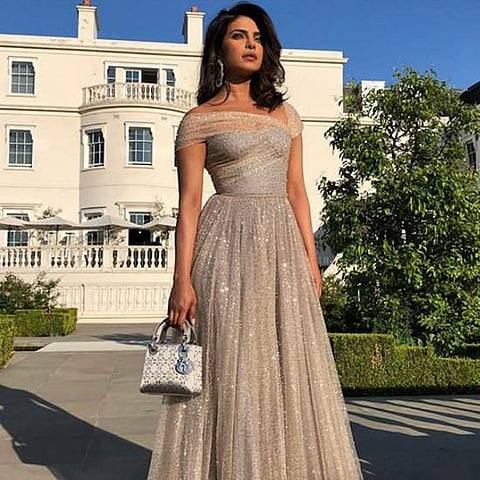 Priyanka Chopra in D'or gown at Prince Harry and Meghan Markle's royal wedding reception.