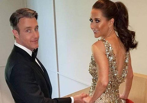 Jessica Mulroney looks stunning in a gold, embellished gown for the private evening reception.