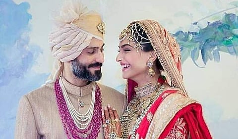 Anand Ahuja and Sonam Kapoor are all smiles on their wedding day