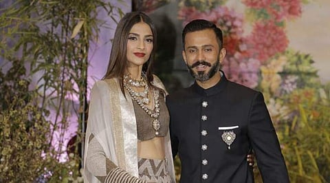 Sonam Kapoor and  Anand Ahuja at their wedding reception