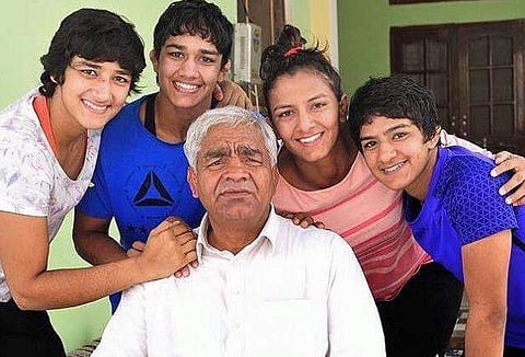 Mahavir Phogat with his daughters