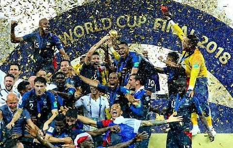 France national team players celebrate after they are handed over the 2018 FIFA World Cup.