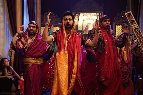 A still of Rajkummar Rao dancing in the song Milegi Milegi