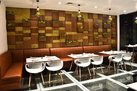 This new Chinese outfit invites you to dine over a koi pond