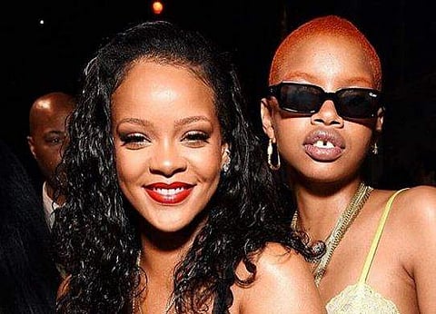 Rihanna and Slick Woods