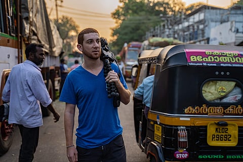 Drew Binsky surveying the streets of Kerala