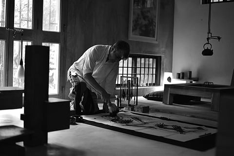 Poet-artist Nilanjan Bandyopadhyay at work