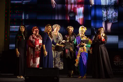 Alokananda Roy being awarded for working with prison inmates and the LGBTQ community