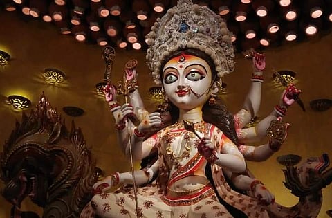 The goddess rides a dragon at the Behala Club puja