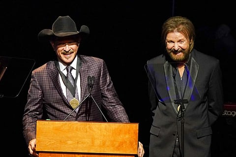 Kix Brooks and Ronnie Dunn (Photo by Sanford Myers/Invision/AP)