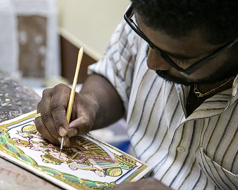 A Tanjore artist at work