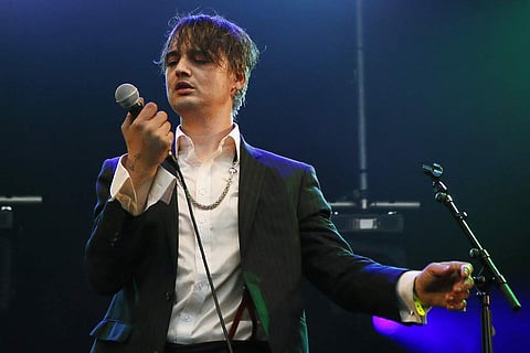 British musician Pete Doherty performs on stage during a concert in Paris (AP Photo/Francois Mori, File)