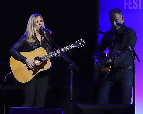 Sheryl Crow, left, and Bruce Springsteen (Photo by Greg AllenInvisionAP)
