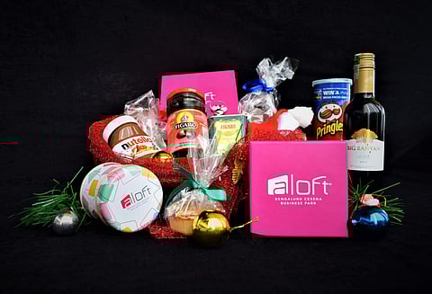 With Yule logs and gingerbread cookies, these holiday hampers are the perfect way to share the joy