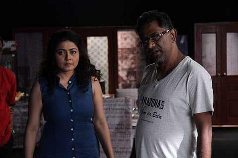 Director Kamaleswar Mukherjee on the setts of Mukhomukhi