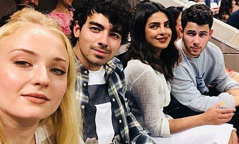 Priyanka Chopra with Nick Jonas accompanied by Joe Jonas and Sophie Turner