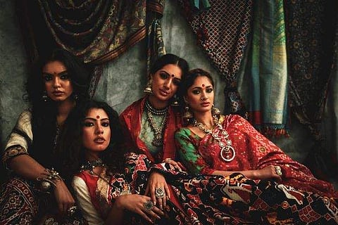 Models in Ayush Kejriwal saris