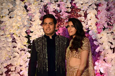 Akash Ambani and Shloka Mehta Ambani during their wedding reception at Jio World Garden in Mumbai on March 10, 2019. (Photo: IANS)