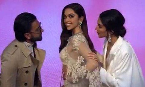 Ranveer Singh and Deepika Padukone with Deepika's wax statue
