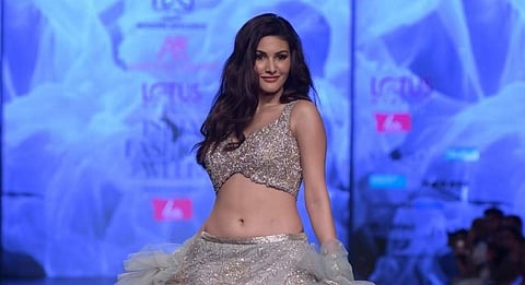 New Delhi: Actress Kritika Kamra showcases a creation of fashion designer Ashwini Reddy on the third day of Lotus India Fashion Week in New Delhi, on March 15, 2019. (Photo: Amlan Paliwal/ IANS)