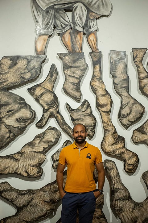 Artist Prabhakar Pachpute at the Biennale. All images courtesy Kochi Biennale Foundation.