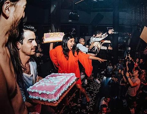 Priyanka Chopra, Nick Jonas and Joe Jonas at Steve Aoki's concert