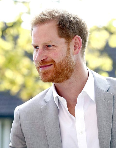 Wellwishers welcome Britain's Prince Harry as he arrives for the official opening of 'Future', a new Youth Zone in London, Thursday April 11, 2019. (Chris Jackson/PA via AP)
