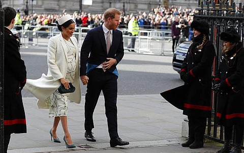 Prince Harry and Meghan attend the Commonwealth Service at Westminster Abbey on Commonwealth Day in London on March 11, 2019. (AP Photo/Frank Augstein)