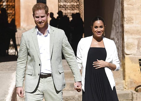 Prince Harry and Meghan visit the Andalusian Gardens in Rabat, Morocco on Feb. 25, 2019. (Facundo Arrizabalaga/Pool Photo via AP)