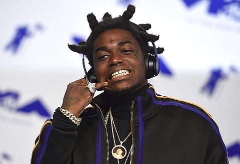File photo: Kodak Black (Photo by Jordan Strauss/Invision/AP)
