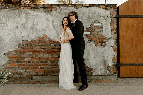Michelle Branch and Patrick Carney pose for a photo in New Orleans. (Katch Silva via AP)