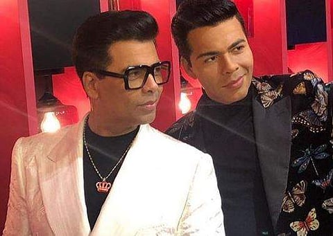 Karan Johar unveils his wax statue at Madame Tussauds Singapore; shares picture with mother Hiroo Johar
