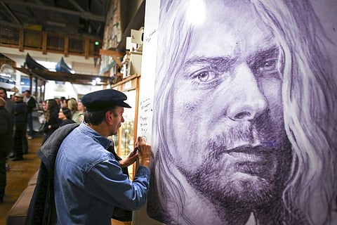 Fans mourn grunge rock icon Kurt Cobain of Nirvana 25 years after death (Joshua Trujillo/seattlepi.com via AP, File)