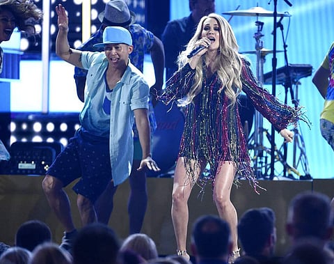 Carrie Underwood performs 'Southbound' at the 54th annual Academy of Country Music Awards at the MGM Grand Garden Arena in Las Vegas. (Photo by Chris Pizzello/Invision/AP)